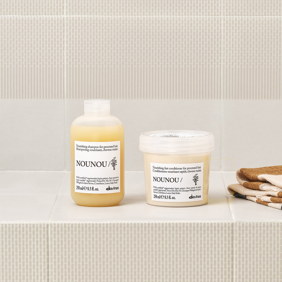 Davines Nederland NOUNOU Conditioner - Voedende snelwerkende conditioner voor behandeld haar.