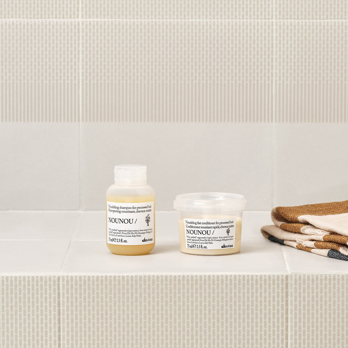 Davines Nederland NOUNOU Conditioner - Voedende snelwerkende conditioner voor behandeld haar.